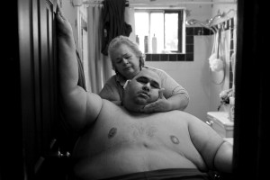After years of gaining and losing hundreds of pounds, Hector Garcia Jr. was once again stuck in the back bedroom of his parents' modest house in San Antonio, Texas. At almost 600 pounds, he finds simple daily tasks like bathing a challenge. He struggled to walk across the hall from his bedroom to the bathroom so his mother, Elena Garcia, could wash him after cutting his hair in November 2010. A month before, Hector started dieting after he realized he was close to his highest known weight, 636 pounds.